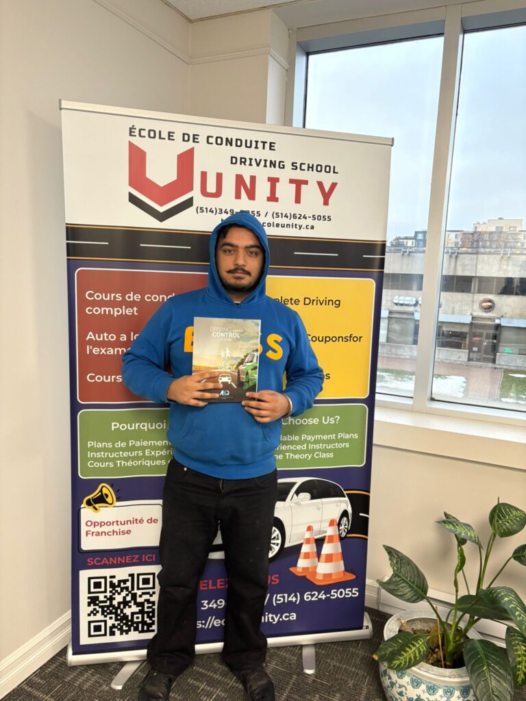 Happy student celebrating passing driving test